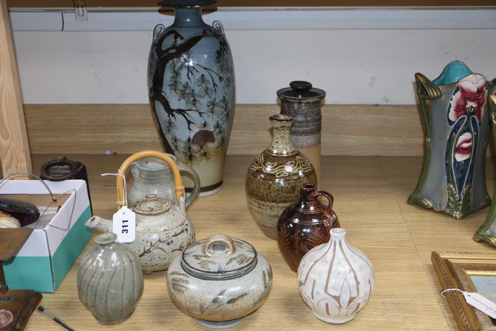 Seven Studio pottery vessels, including a Roger Cockram bottle vase, 22cm and a teapot marked JM in an oval